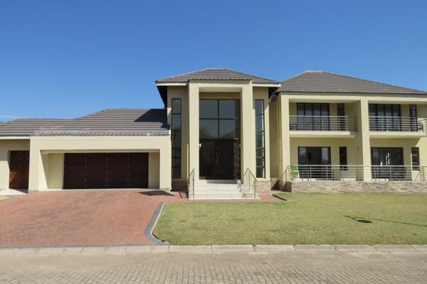 4 Bedroom House For Sale in Koro Creek Golf Estate, Modimolle

Key Features:

Spacious and Elegant: Double-volume entrance hall ...