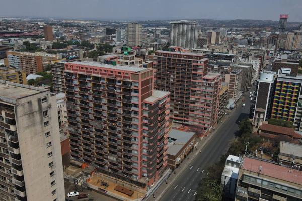 The subject property apartment building offers a comfortable and practical living environment in the
heart of Hillbrow. The building is a 16-storey structure with a contemporary design, featuring common
areas and secure access points. It caters to a diverse community ...