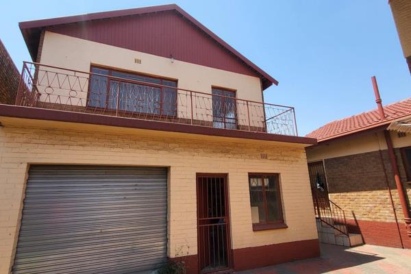 Nestled in the heart of Actonville, this charming four-bedroom house offers an inviting blend of history and modern potential. With its ...