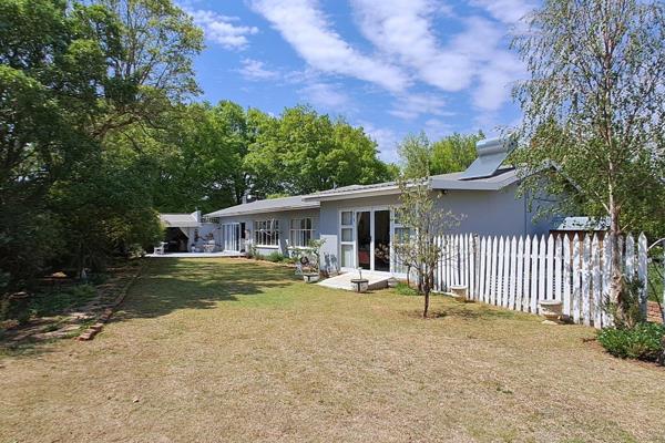 Step into this expansive open-plan gem, perfectly suited for family living.

The formal lounge, with stack doors, opens up to an ...