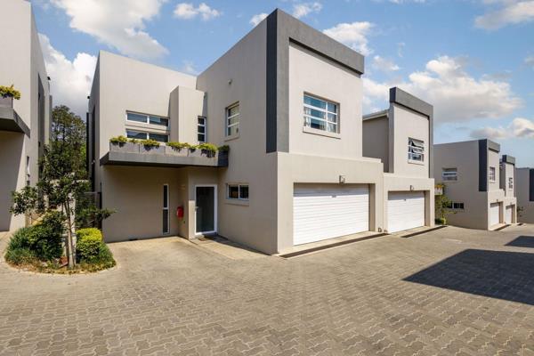 This stunning townhouse is located in the sought-after suburb of Bryanston and offers a spacious and modern living space. The open-plan ...