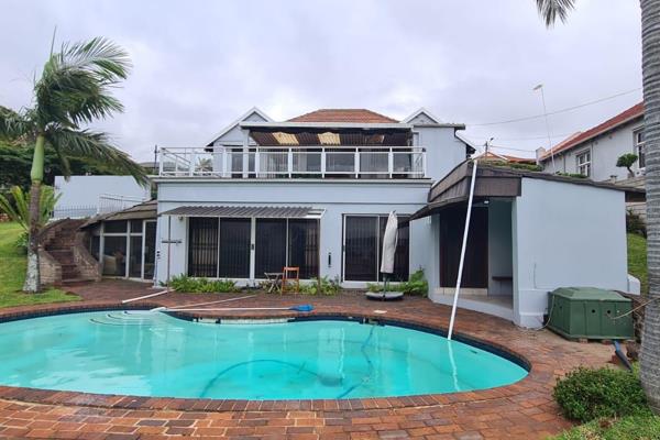 Awesome Sea and City views from this well positioned Durban north family home with Granny cottage.
Drive in access to Automated double ...