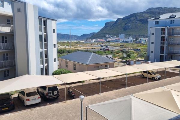 Stunning beach views over False Bay, 5 minutes from trendy restaurants and local ...