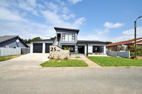 This beautifully renovated 5-bedroom home in Stilbaai offers a seamless blend of modern ...