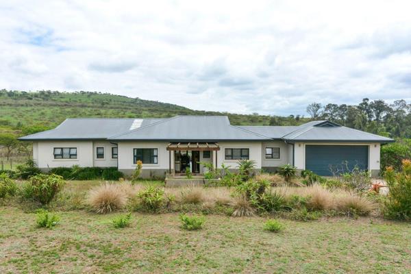 Take a deep breath and unwind whilst enjoying stunning dam views from the covered patio of this gorgeous one-level home, situated in ...