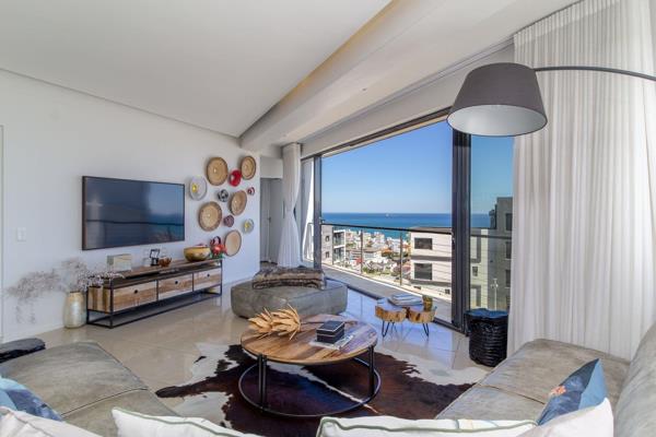 Discover the pinnacle of coastal luxury in this stunning two-bedroom apartment, nestled in the vibrant heart of Sea Point. With ...