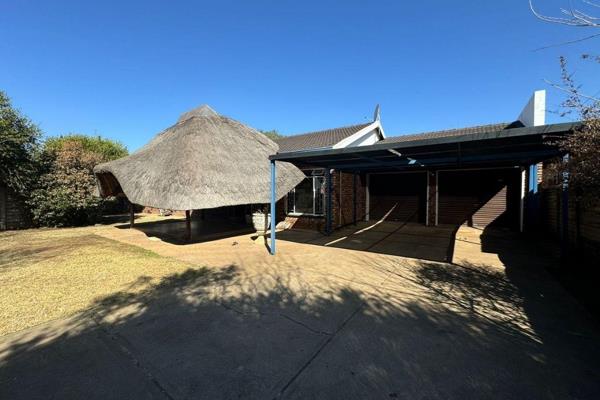 Located in a sought-after neighborhood within walking distance of Volkskool and Potchefstroom Hospital, this versatile 4-bedroom family ...