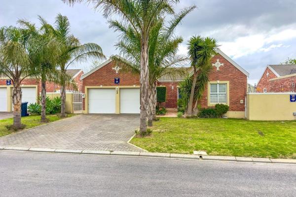 Upon entering, you&#39;ll find an open-plan living area with tiled flooring, ideal for ...