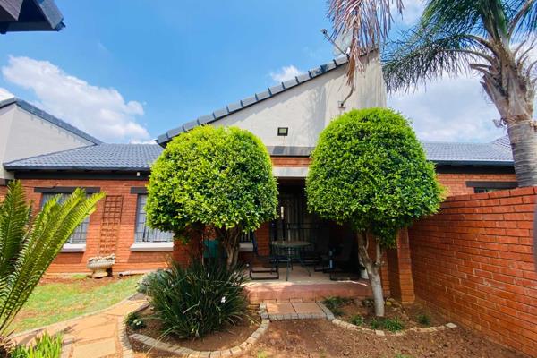 Welcome to your dream home in the prestigious Mooikloof Ridge Estate! This stunning two-bedroom townhouse combines modern elegance with ...