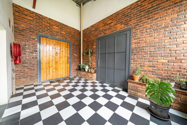 This spacious two-bedroom loft is the perfect blend of modern style and comfort, set in the trendy Braamfontein Werf area. The ...