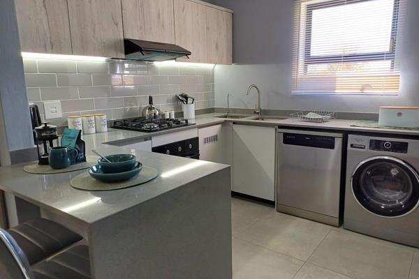 A brand new modern and spacious 3 bedroom 2 bathroom garden apartment in a smart, green ...