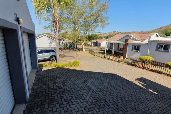 This Property has the following to offer  :

There is a double garage with lots of open parking spaces in front of the garages. a ...