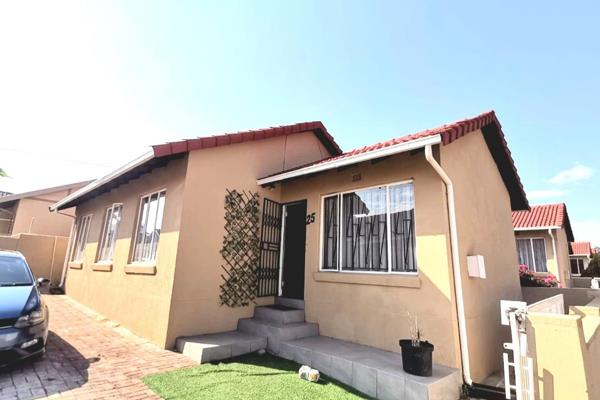 Stunning three bedroom cluster home | private paved yard | two bathrooms | great value ...