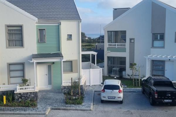 Secure 2 Bedroom 1 bathroom apartment within walking distance to beach and village.