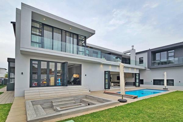 Come and make this dream home your reality. Beautifully designed, masterfully built, and a nearly 1200m2 home that feels like it is ...