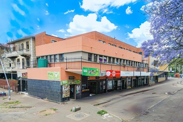 Fully let retail and residential block set on a prime corner with high foot and ...