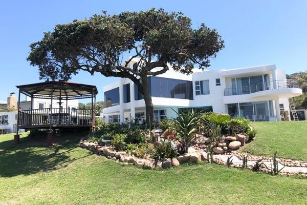 Discover unparalleled coastal luxury in this ultra-modern double-storey beachfront home, designed for both relaxation and entertaining. ...