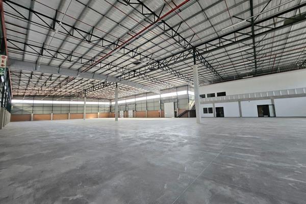 This industrial property features a 2,986 m2 warehouse, 292 m2 of office space, a 136 m2 ...