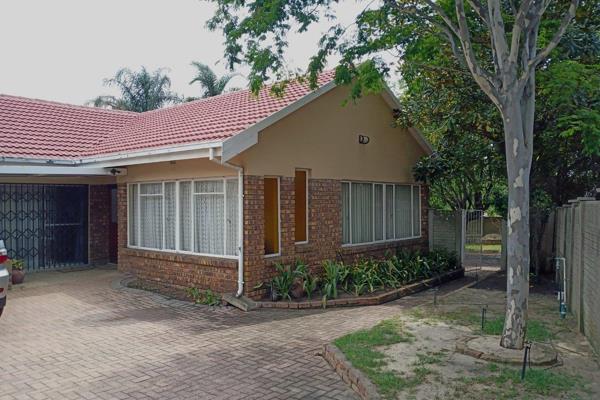 Patio entrance with a security gate leading to Reception area or study, all tilled and neat.
T.V room with blinds and carpet, Tiled ...