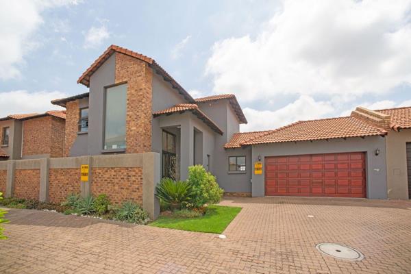 This stunning double-storey home is located in a sought-after estate and offers a blend of luxury and practicality. It boasts a modern ...