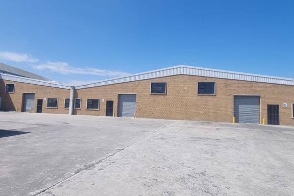 This spacious warehouse offers a wide, open-plan layout, perfect for various industrial ...