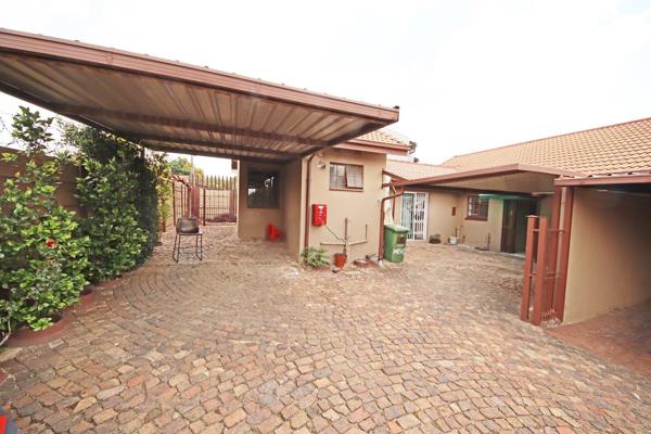 Entrance hall and lounge leading to a covered patio
Office/ study or 3rd bedroom
Kitchen with space for 2 major appliances
3 ...