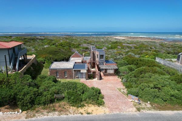 Embrace coastal living in this artistic gem located at the entrance of Suiderstrand, within the breathtaking Agulhas National Park. ...