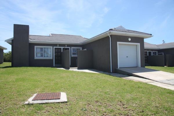 Welcome to your dream home nestled in the serene Kidds Beach, Eastern Cape, South Africa. This newly listed 3-bedroom, 2-bathroom brick ...