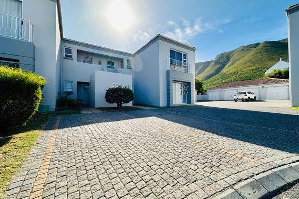 This ground floor apartment has an open plan living area, with two bedrooms and two full bathrooms. There is a built in braai in the ...