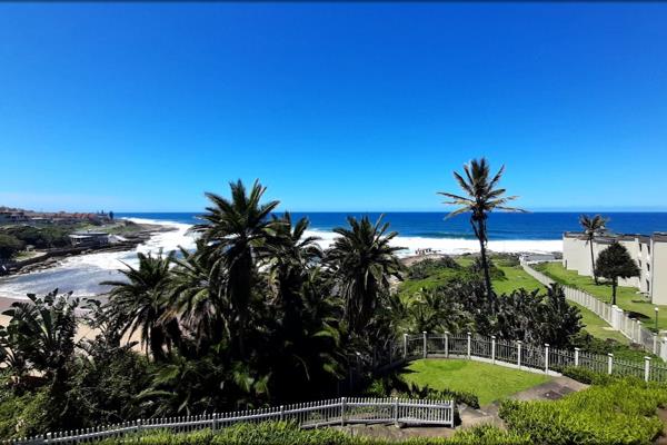 Nestled in a sought-after complex on Uvongo&#39;s main beach, this stylishly furnished 3-bedroom apartment offers the perfect coastal ...