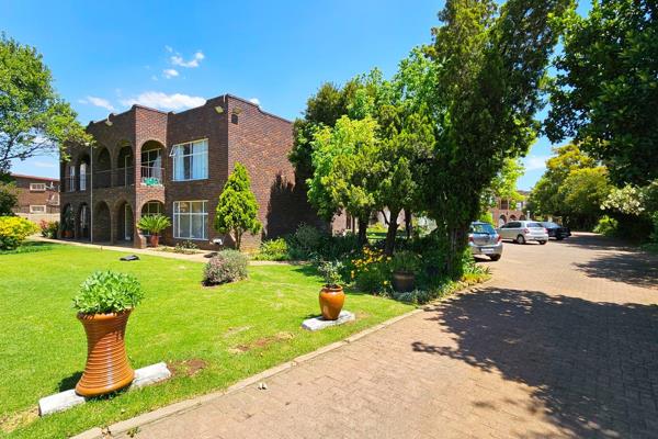 A meticulously maintained development comprising only a small number of Attractive dark face brick units with lock up garages on a ...