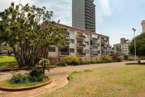 Renovated 2-bedroom, 1-bathroom flat with outside street parking. Just a short walk to Amanzimtoti center and right on the promenade. ...