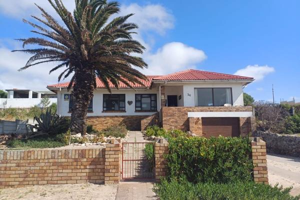 Discover this hidden gem in Saldanha Central, offering endless potential and breathtaking 180&#176; sea views. This 3-bedroom ...