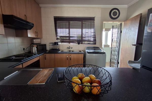 This modern 2-bedroom apartment is beautifully tiled throughout, creating a seamless and stylish living space. The open-plan design ...