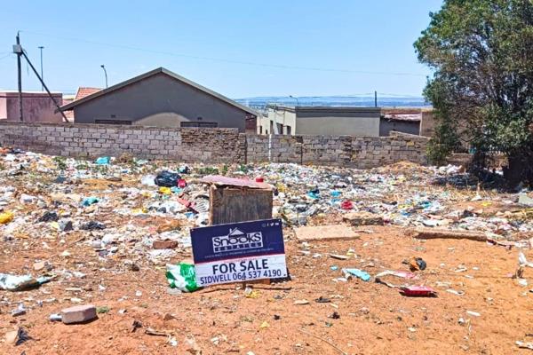 Vacant land with approved building plans