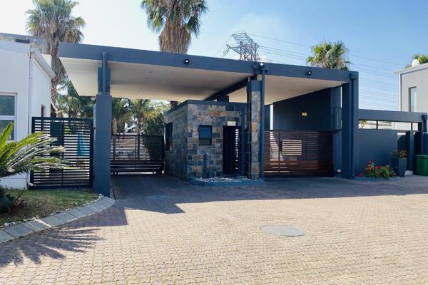 Nestled in a close-knit estate near Midrand’s major landmarks, this stunning home is a ...