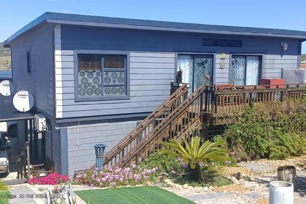 Nestled in the tranquil and secure suburb of Seemeeu Park, Mossel Bay, this 3-bedroom nutech home embodies the very best of coastal ...