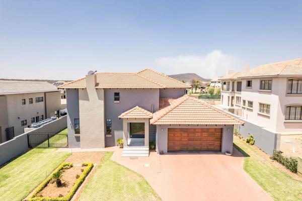 *SOLE AND EXCLUSIVE MANDATE*

Nestled within the lush, secure Pebble Rock Golf Estate in ...