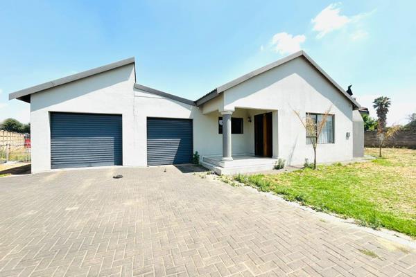 This charming family home offers comfort and practicality. Step into a spacious lounge with modern tiled flooring, perfect for ...