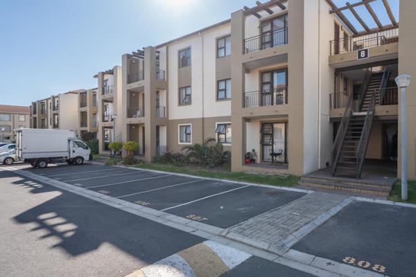 This first-floor apartment is located in a well-maintained complex near amenities ...