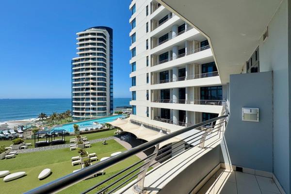 This modern studio apartment at The Pearls of Umhlanga offers stunning sea views and a ...