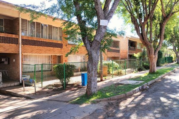 Spacious and secure ground floor unit offering 2 well-sized tiled bedrooms with built-in ...