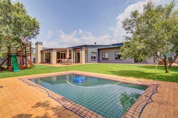 Welcome to your dream family home in the stunning Serengeti Golf Estate! This charming four-bedroom residence is perfectly designed for ...