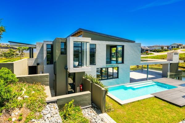 Discover the epitome of lifestyle and luxury in the prestigious Oubaai Golf Estate, where this breathtaking architectural masterpiece ...