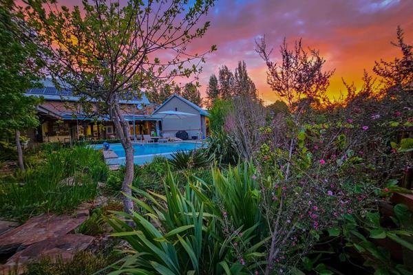 ON SHOW - By appointment only!

Nestled within a captivating landscape, this sophisticated 5-bedroom farm-style home is a tranquil ...