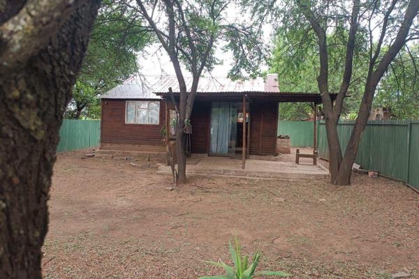 Escape to tranquility in this delightful 2-bedroom cabin, perfect for those seeking a cozy getaway or a permanent residence surrounded ...