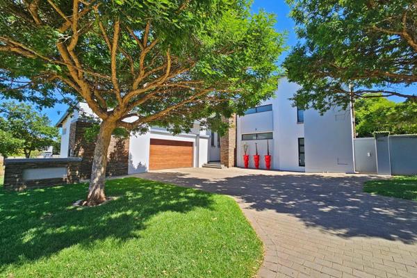 Discover the perfect blend of luxury and privacy in this exquisite corner property, ideally situated next to a greenbelt, offering ...