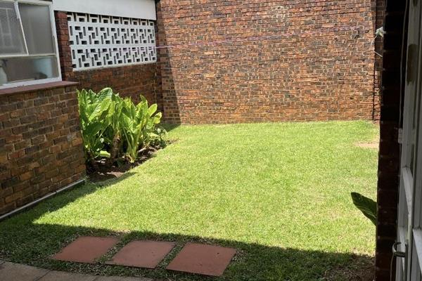 Sunny spacious 2 bedroom unit. Small garden