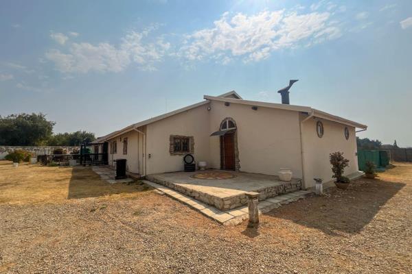 Welcome to this delightful main house, perfectly situated on a pan handle shared plot with 2 cottages. This spacious residence features ...