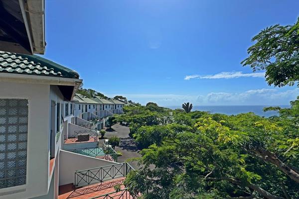 Discover your dream home in a lush, tree filled complex with seaviews. This spacious ...